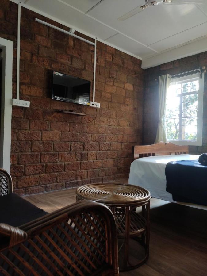The Rustic Cottage - Homestay เชร์ราปุนจี ภายนอก รูปภาพ